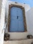 Blue traditional door to Santorini in the cyclades islands in Greece.