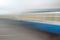 Blue Train Carriage Speeding Past