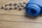 Blue training mat and massager with wooden castors