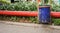 A blue trash can on the roadside photo taken in Semarang Indonesia