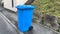 Blue trash cans for paper and further processing