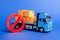 A blue truck loaded with boxes and a red symbol NO. Embargo trade wars. Restriction on importation, ban on export of dual-use