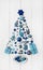 Blue and turquoise christmas tree of small miniatures on white w