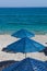 Blue umbrellas on a beach