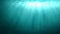 Blue underwater scene with rays of sunlight