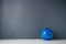 Blue vases on the table and gray walls