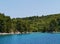 A blue vessel in a bay in Croatia