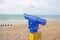 Blue viewfinder telescope at seaside beach