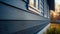 Blue vinyl siding texture and window, close-up view