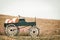 Blue wagon full of pumpkins in farm