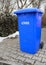 Blue waste bin with german sign reading Wastepaper