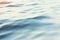 Blue water background with ripples, sea, ocean wave low angle view. Close-up Nature background. Soft focus with