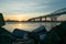 The Blue Water Bridge in Port Huron Michigan at sunrise facing canada