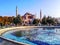 Blue water fountain pool on the background of Hagia Sophia in Istanbul. Beautiful view of