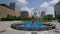 Blue water fountain with Runner Statue at Kiener Plaza Park in St. Louis - ST. LOUIS, UNITED STATES - JUNE 19, 2019