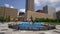 Blue water fountain with Runner Statue at Kiener Plaza Park in St. Louis - ST. LOUIS, UNITED STATES - JUNE 19, 2019