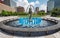 Blue water fountain with Runner Statue at Kiener Plaza Park in St. Louis - ST. LOUIS, USA - JUNE 19, 2019