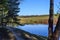 The blue water of the river and the blue sky without clouds. A place to relax outside the city.