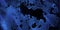 Blue water surface. Abstract blue dust  on black background. Paint burst