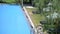 Blue water surface texture of summer holiday vacation swimming pool ripples and wave, Refraction of sunlight top view, sun shine w