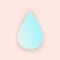 Blue waterdrop on beige background