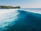 Blue wave in ocean, drone shot. Aerial view of barrel wave