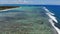 Blue waves in tropical ocean and coastline. Aerial view of waves, One eye spot