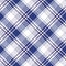 Blue and white argyle tartan plaid. Scottish pattern fabric swatch close-up.