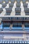 Blue and white awnings over glass window in hotel, concept decoration for shading