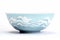 A blue and white bowl sitting on top of a table. Imaginary oriental pottery.