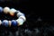 Blue and white color tone lucky fortune stone bracelet include which Lapis lazuli, Sodalite, Howlite and Moonstone on black wool b