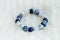 Blue and white color tone lucky fortune stone bracelet include which Lapis lazuli, Sodalite, Howlite and Moonstone on white wool b