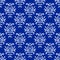 Blue and white damask ikat ornament geometric floral seamless pattern, vector