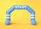Blue and white inflatable start line arch on yellow background