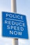 Blue and white pole mounted police reduce speed now sign St Annes on Sea Fylde Coast February 2019