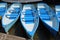 Blue and white rowing boats.