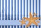 Blue white stripe pattern with starfishes
