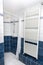 Blue with white tiled shower room