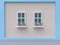 Blue white wall brick two windows and pink flower-pot cartoon style 3d render