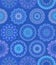 Blue winter background with intricate colorful snowflakes. Print for fabric, wallpaper, wrapping design