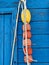 Blue wooden fisher houses in Olhos de Agua in Portugal