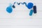 blue wool ball measuring tape spool yarn wooden desk. High quality photo