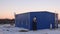 Blue workshop with chimneys at wastewater treatment station