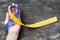 Blue yellow awareness ribbon on helping hand for World down syndrome day WDSD March 21 raising support on patient