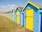 Blue and yellow beach huts