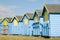 Blue and yellow beach huts