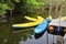 Blue and yellow kayaks