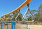 Blue and yellow play equipment in a school playground