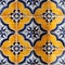 Blue and yellow tile with detailed patterns and craftsmanship (tiled)