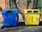 Blue and Yellow wheelie bins